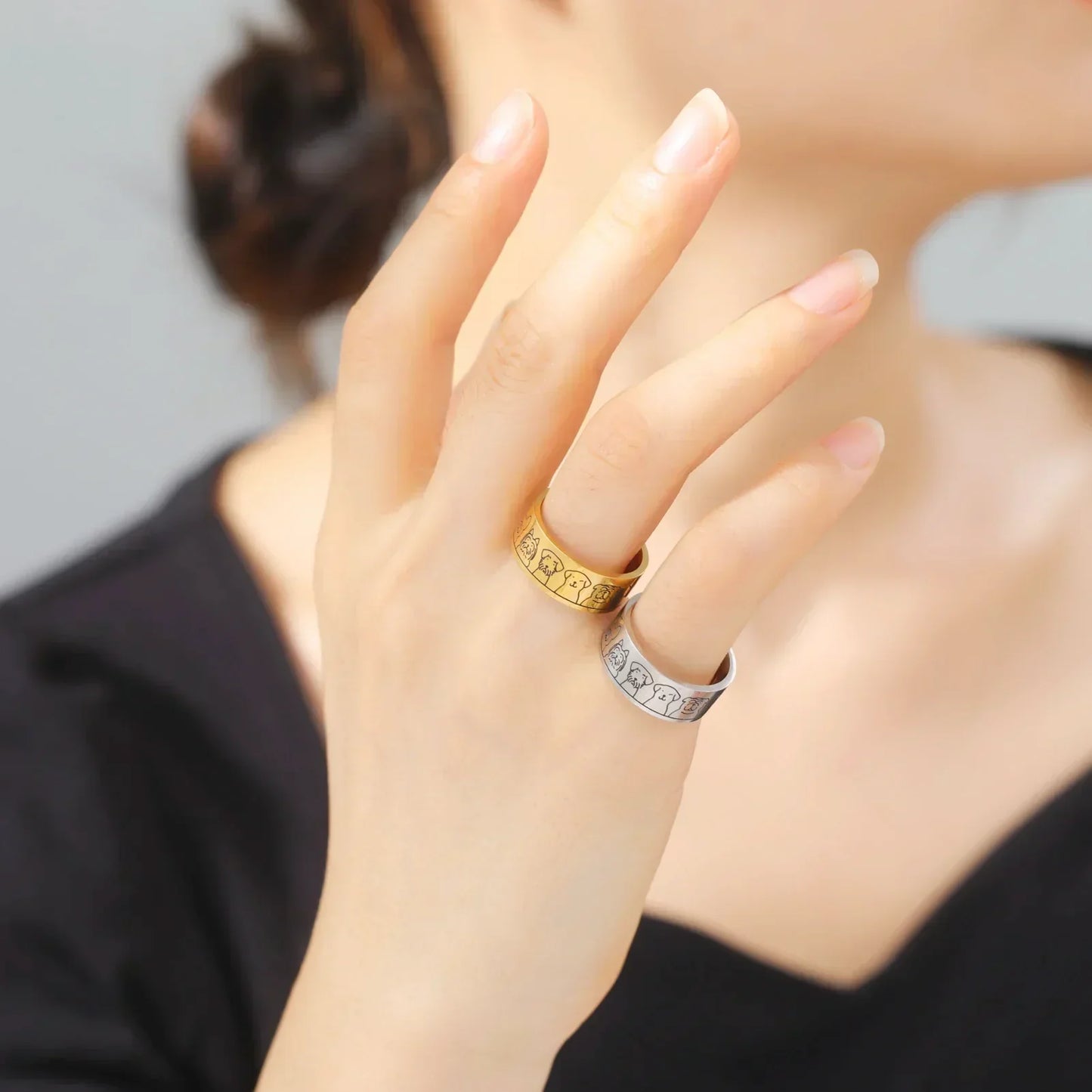 Wide stainless steel ring with dog motifs – engraved design for women