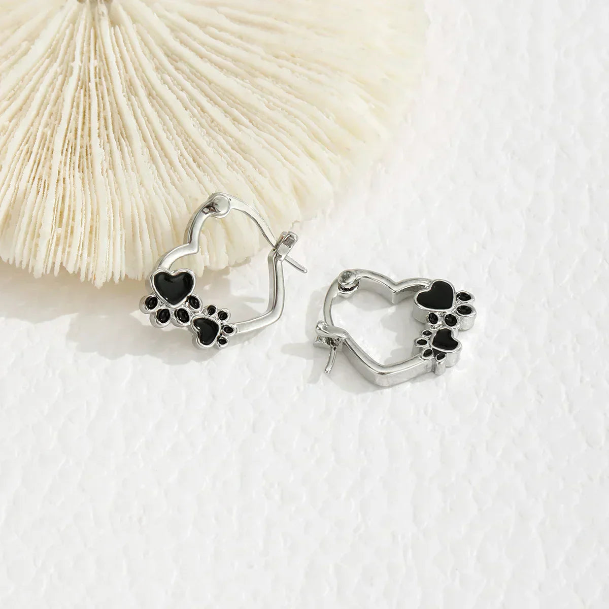 Hart-Poot Hoop Earrings โ Silver Animal Motif Earrings with Black Enamel Design
