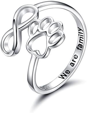 Handmade heart-shaped ring with paw print in sterling silver and adjustable