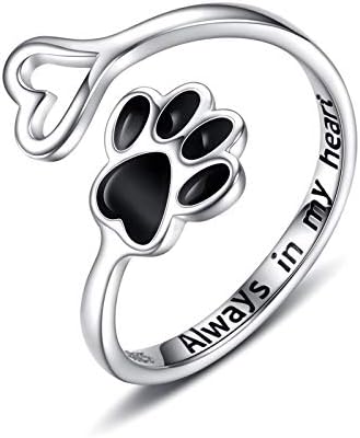 Handmade heart-shaped ring with paw print in sterling silver and adjustable