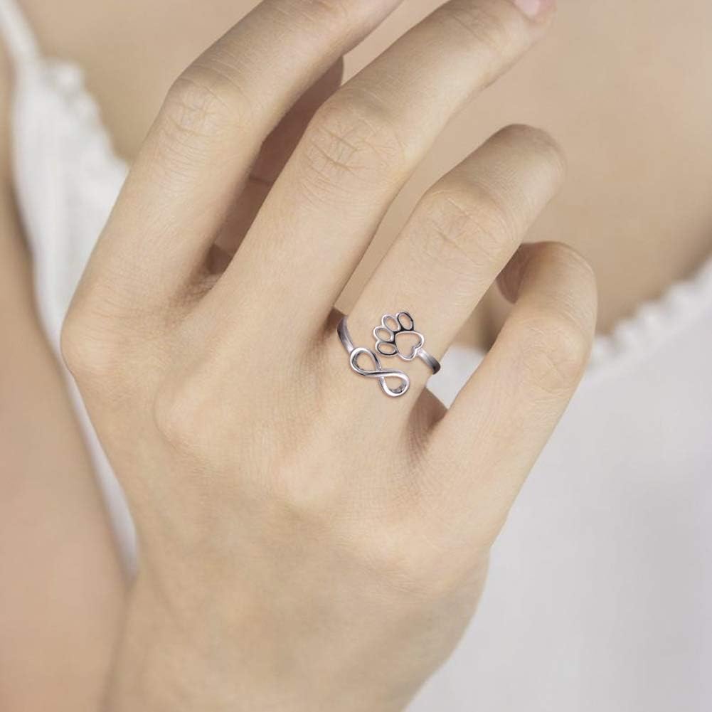 Handmade heart-shaped ring with paw print in sterling silver and adjustable