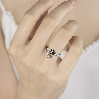 Handmade heart-shaped ring with paw print in sterling silver and adjustable