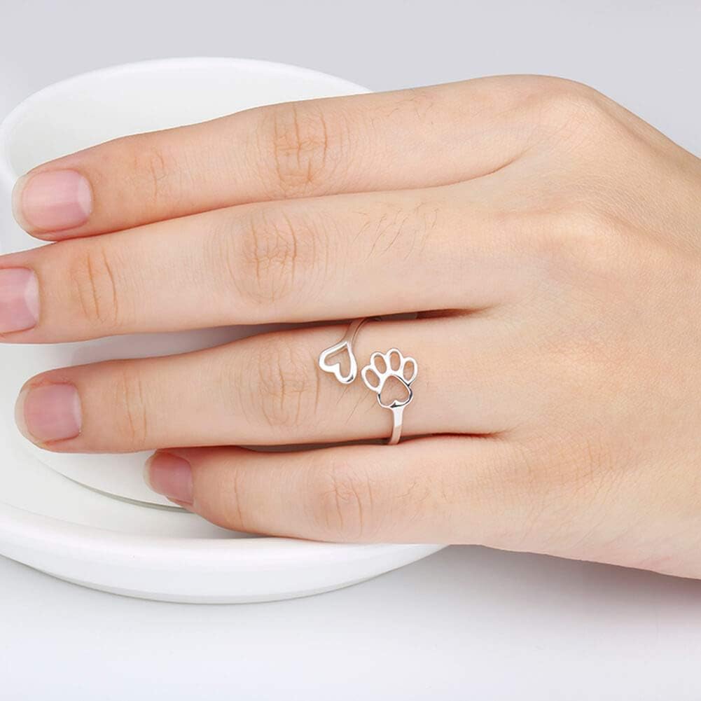 Handmade heart-shaped ring with paw print in sterling silver and adjustable
