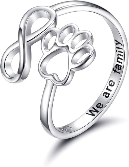 Handmade heart-shaped ring with paw print in sterling silver and adjustable