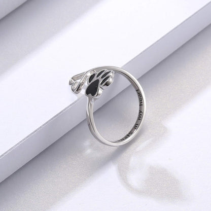 Handmade heart-shaped ring with paw print in sterling silver and adjustable