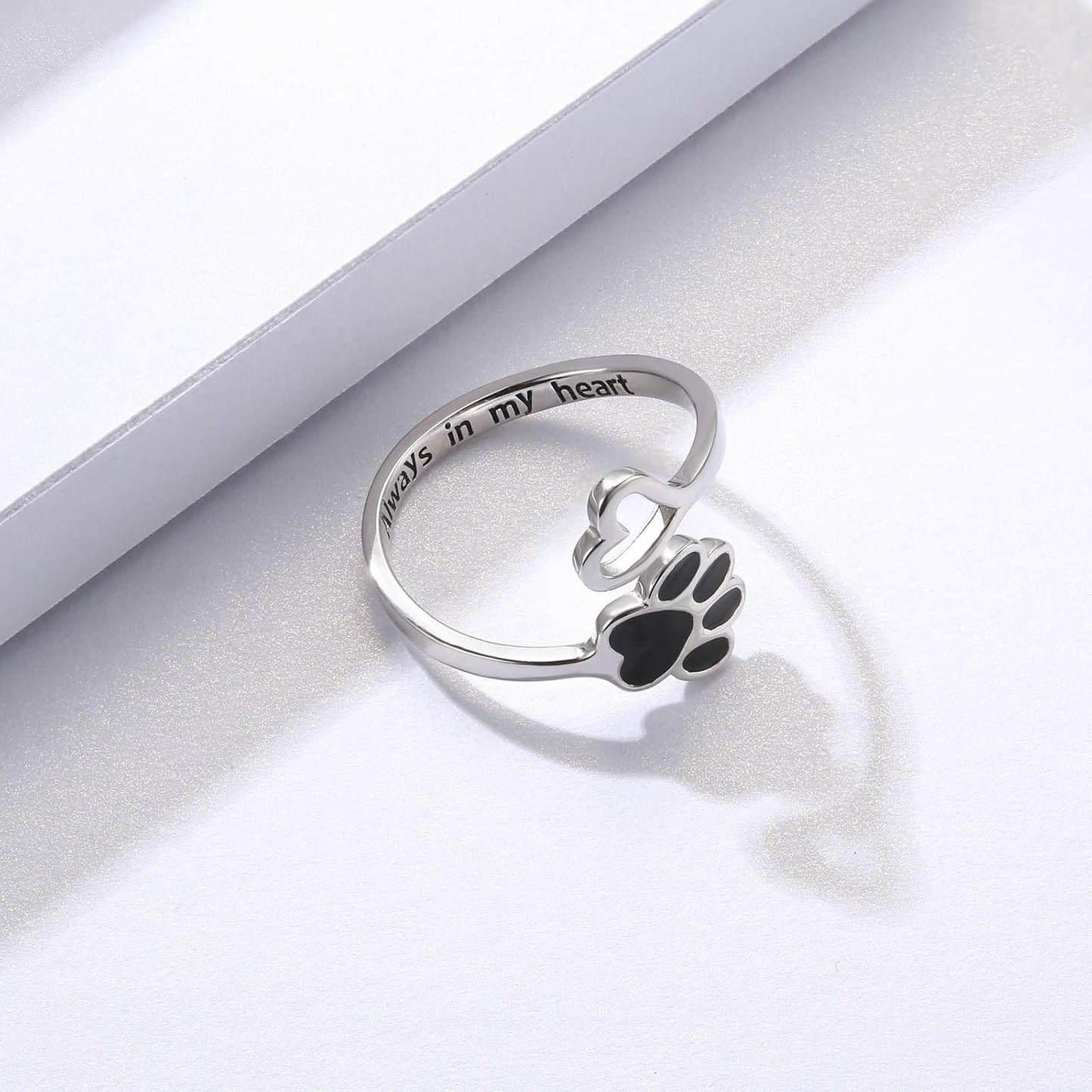 Handmade heart-shaped ring with paw print in sterling silver and adjustable