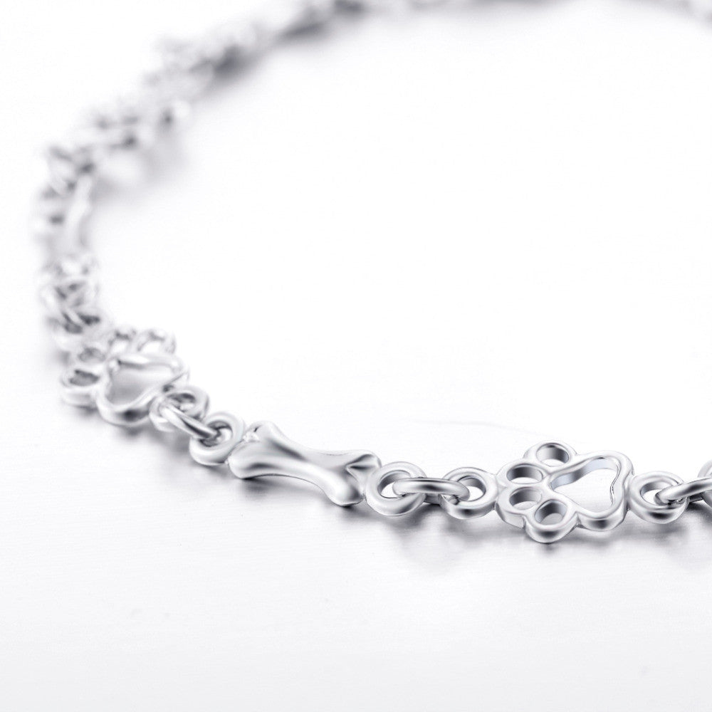 Bracelet with Dog Paw and Bone Charms in Pure Silver