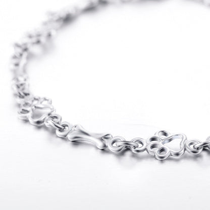 Bracelet with Dog Paw and Bone Charms in Pure Silver