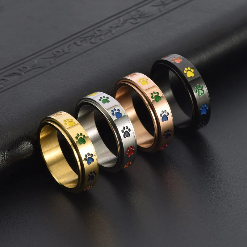 Rotatable anti-stress ring with paws – stainless steel ring with rainbow colours