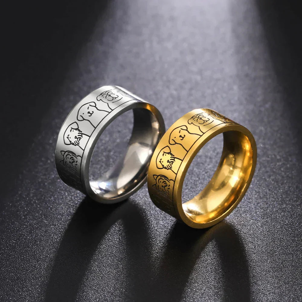 Wide stainless steel ring with dog motifs – engraved design for women