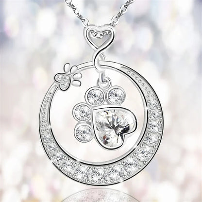 Charming silver paw print necklace with zirconia