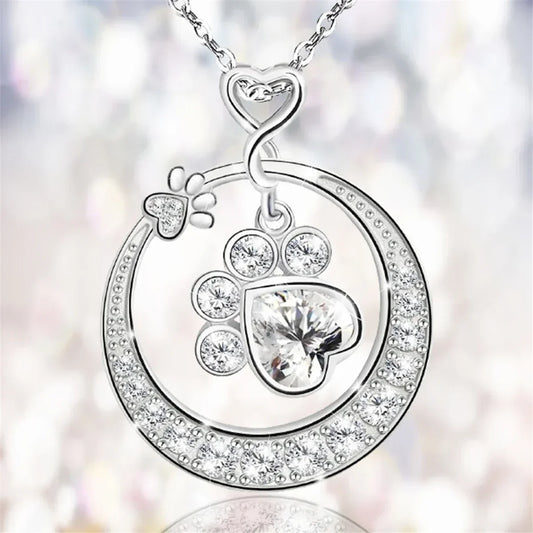 Charming silver paw print necklace with zirconia