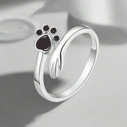 Adjustable Paw Ring in Sterling Silver – Hand-in-Paw Design
