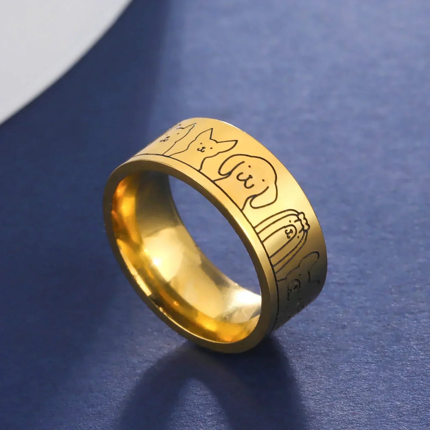 Wide stainless steel ring with dog motifs – engraved design for women