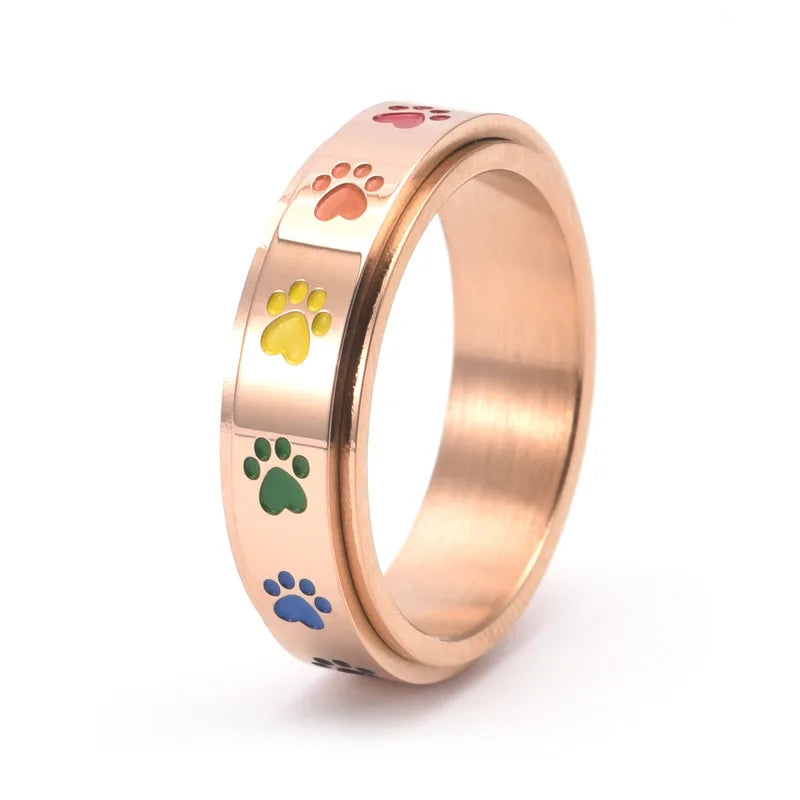 Rotatable anti-stress ring with paws – stainless steel ring with rainbow colours