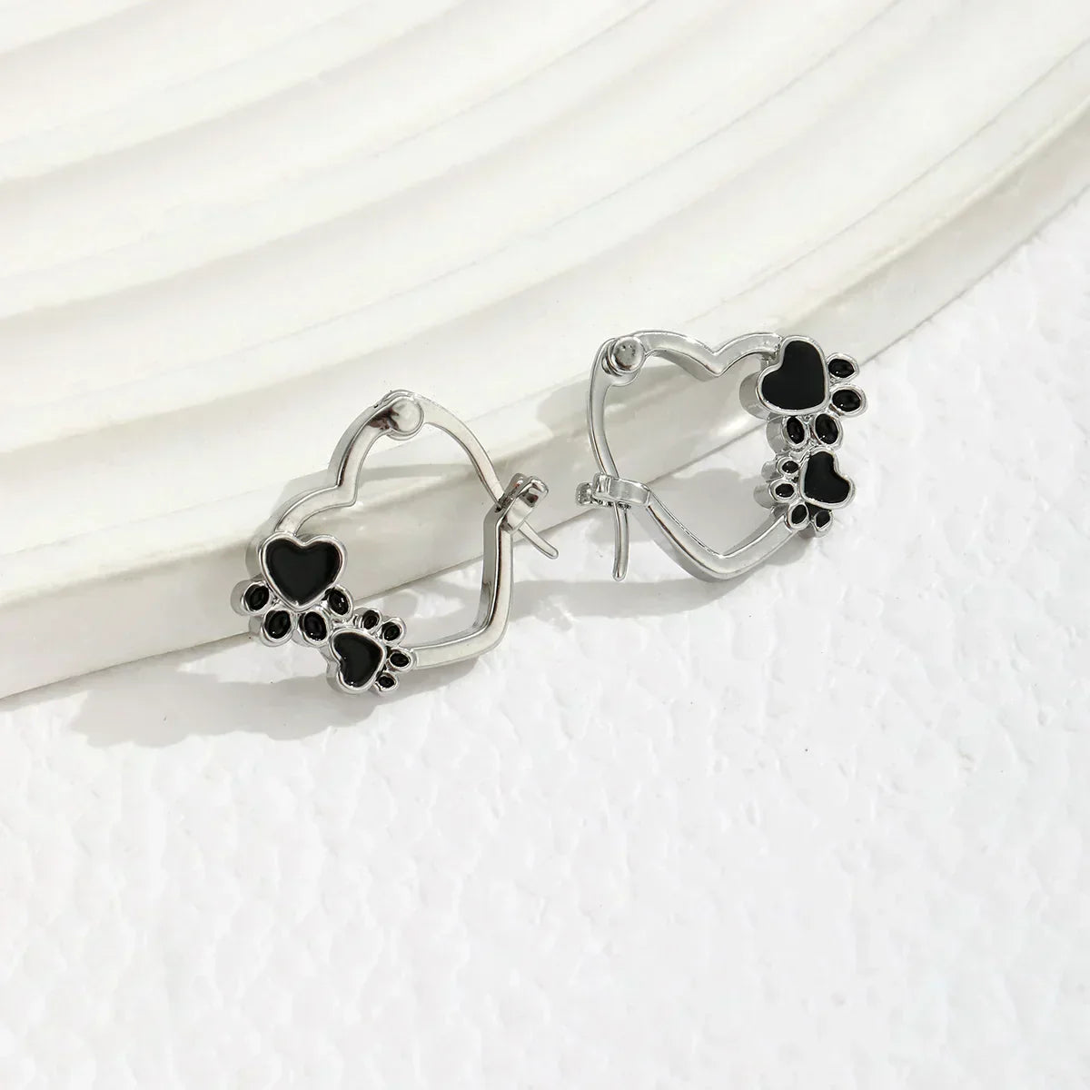 Hart-Poot Hoop Earrings – Silver Animal Motif Earrings with Black Enamel Design