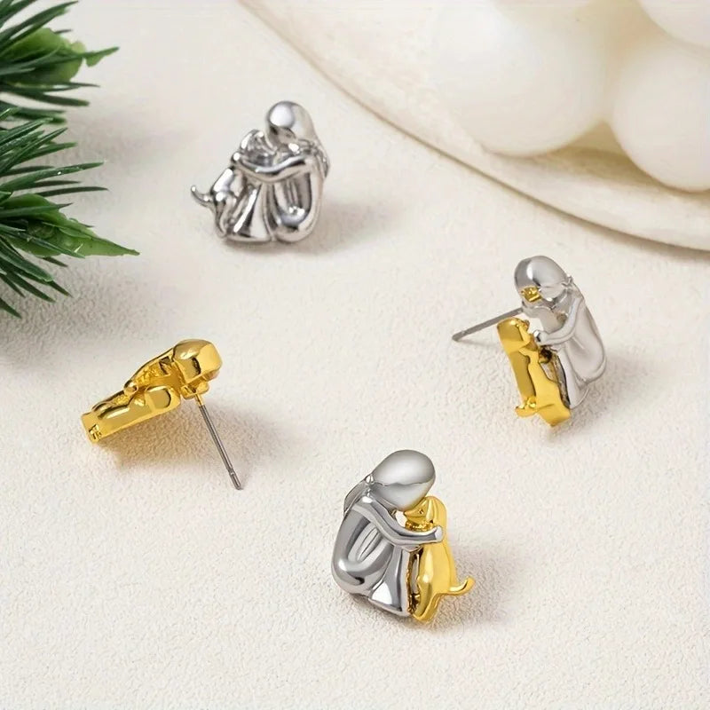 Sweet two-tone hugging earrings in silver and gold