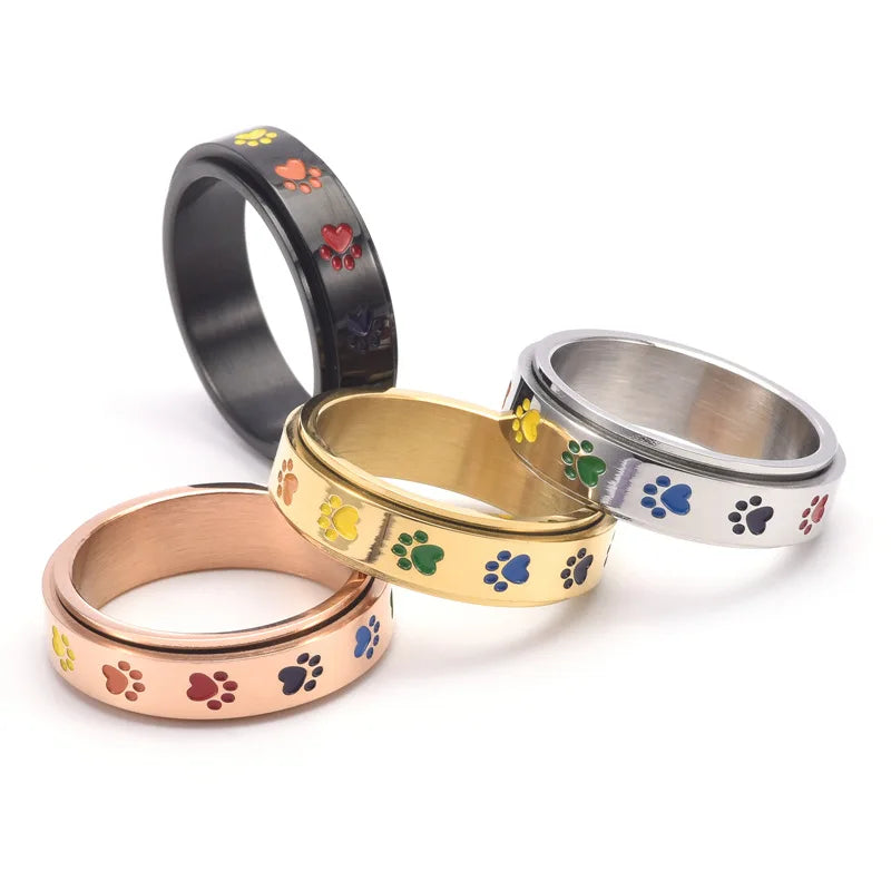 Rotatable anti-stress ring with paws – stainless steel ring with rainbow colours