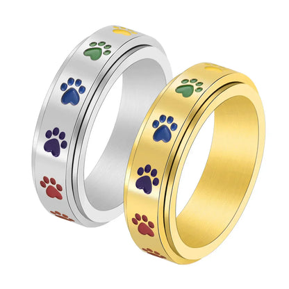 Rotatable anti-stress ring with paws – stainless steel ring with rainbow colours